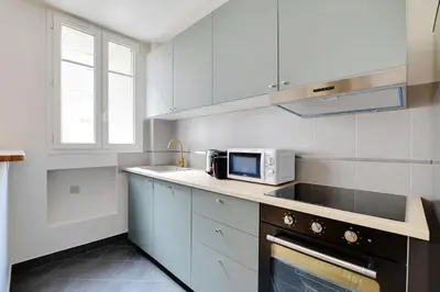 Cuisine ou kitchenette dans l'établissement Modern apartment 1BDR - 4P à Boulogne Billancourt