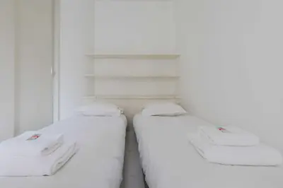 Un ou plusieurs lits dans un hébergement de l'établissement Peaceful flat - 2BD-9P - Passy-Tour Eiffel
