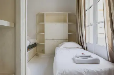 Un ou plusieurs lits dans un hébergement de l'établissement Peaceful flat - 2BD-9P - Passy-Tour Eiffel