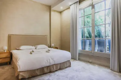 Un ou plusieurs lits dans un hébergement de l'établissement Peaceful flat - 2BD-9P - Passy-Tour Eiffel