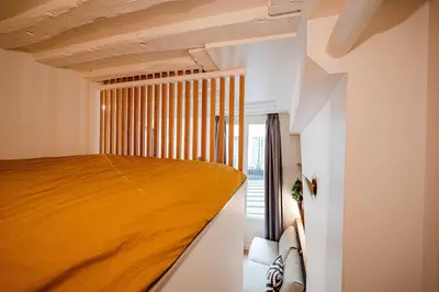Un ou plusieurs lits dans un hébergement de l'établissement Cosy apt - 1BD - 4P - Montorgueil - Palais Royal