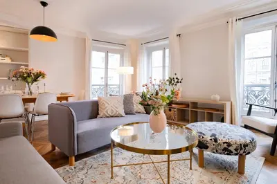 Coin salon dans l'établissement Luxury Flat Louvres 6 Guests
