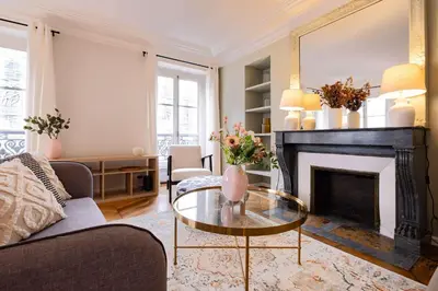 Coin salon dans l'établissement Luxury Flat Louvres 6 Guests