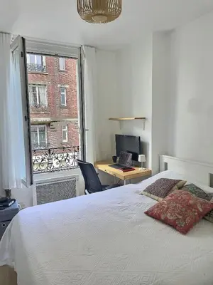 Un ou plusieurs lits dans un hébergement de l'établissement Appartement Chill proche Paris quartier calme proximité de toutes commodités Idéal Professionels et petite famille moins 15 pourcent long séjour