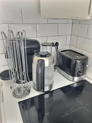 Cuisine ou kitchenette dans l'établissement Appartement Chill proche Paris quartier calme proximité de toutes commodités Idéal Professionels et petite famille moins 15 pourcent long séjour