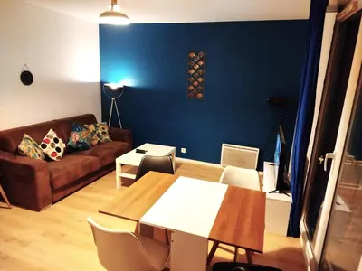 Coin salon dans l'établissement Close to Paris, Metro,RER, 6 People, PKG