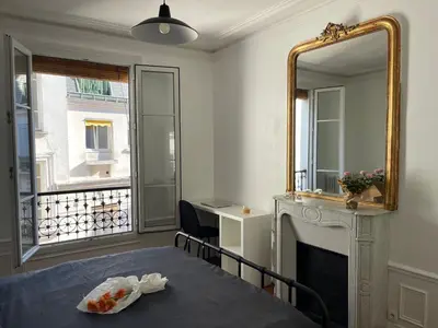 Un ou plusieurs lits dans un hébergement de l'établissement Elegant Parisian Apartment, Marais-Bastille