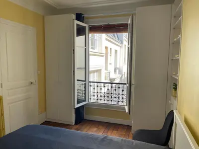 Un ou plusieurs lits dans un hébergement de l'établissement Elegant Parisian Apartment, Marais-Bastille