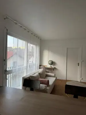 Un ou plusieurs lits dans un hébergement de l'établissement Courbevoie Apartment - HBA