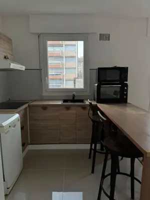 Cuisine ou kitchenette dans l'établissement Courbevoie Apartment - HBA