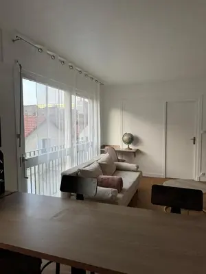 Coin salon dans l'établissement Courbevoie Apartment - HBA