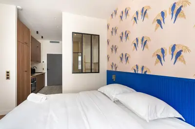 Un ou plusieurs lits dans un hébergement de l'établissement New Studio for 2 near Bastille