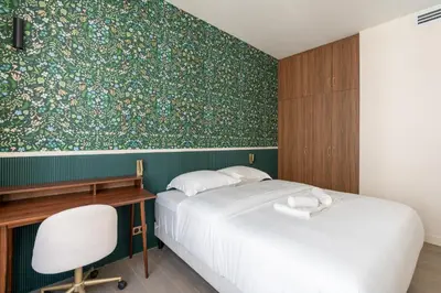 Un ou plusieurs lits dans un hébergement de l'établissement Chic Renovated 1BDR Apartment Near Bastille