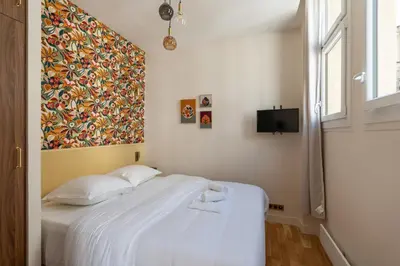 Un ou plusieurs lits dans un hébergement de l'établissement Cosy and Modern Studio for 2 close to Bastille
