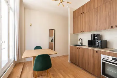 Cuisine ou kitchenette dans l'établissement Cosy and Modern Studio for 2 close to Bastille