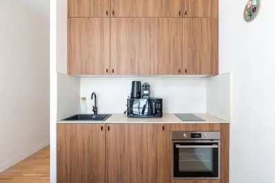 Cuisine ou kitchenette dans l'établissement Cosy and Modern Studio for 2 close to Bastille