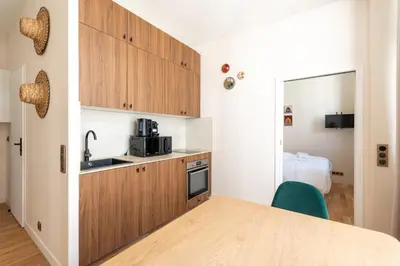 Cuisine ou kitchenette dans l'établissement Cosy and Modern Studio for 2 close to Bastille