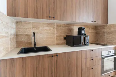 Cuisine ou kitchenette dans l'établissement Stylish Duplex for 4 in Bastille Paris