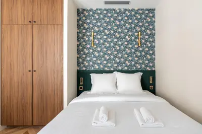 Un ou plusieurs lits dans un hébergement de l'établissement Cozy Paris Studio for 2 near Bastille