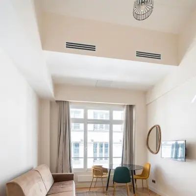Coin salon dans l'établissement Spacious Paris Duplex for 4 Near Bastille