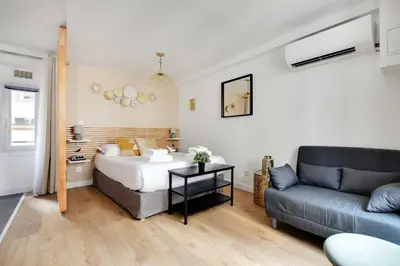 Un ou plusieurs lits dans un hébergement de l'établissement Modern studio in the heart of Paris - Residence