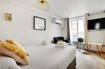 Télévision ou salle de divertissement dans l'établissement Modern studio in the heart of Paris - Residence