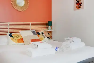 Un ou plusieurs lits dans un hébergement de l'établissement Modern studio in the heart of Paris - Residence