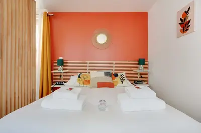 Un ou plusieurs lits dans un hébergement de l'établissement Modern studio in the heart of Paris - Residence