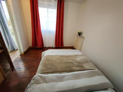 Un ou plusieurs lits dans un hébergement de l'établissement Le Balcon Victor Hugo - Clichy Paris