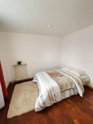 Un ou plusieurs lits dans un hébergement de l'établissement Le Balcon Victor Hugo - Clichy Paris