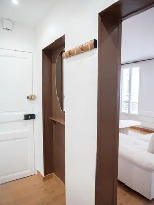 Un ou plusieurs lits dans un hébergement de l'établissement Cosy appartement Levallois