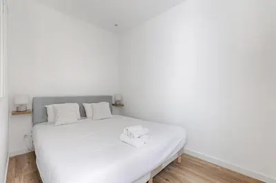 Un ou plusieurs lits dans un hébergement de l'établissement Appartement de charme entre Batignolles et Montmartre
