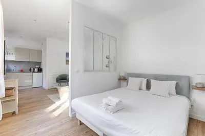 Un ou plusieurs lits dans un hébergement de l'établissement Appartement de charme entre Batignolles et Montmartre