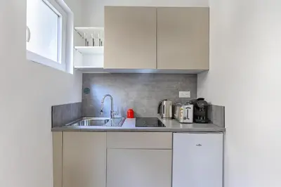 Cuisine ou kitchenette dans l'établissement Appartement de charme entre Batignolles et Montmartre