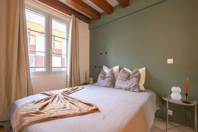 Un ou plusieurs lits dans un hébergement de l'établissement Elegant 1 BR - Palais Royal 2
