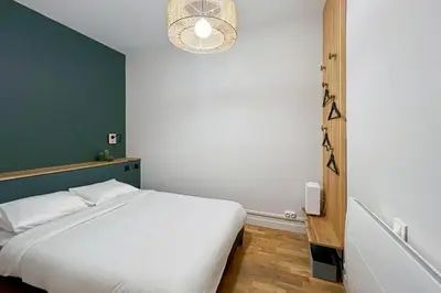 Un ou plusieurs lits dans un hébergement de l'établissement Beautiful Souplex - 2P - Nation