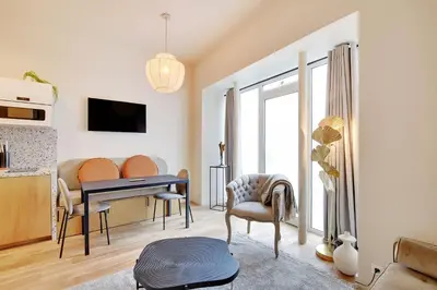 Télévision ou salle de divertissement dans l'établissement Serene apartment - 1BR 4P - Canal St-Martin