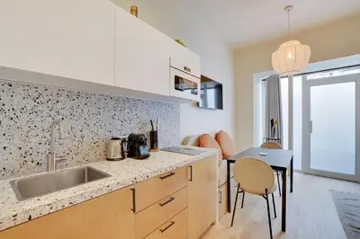 Cuisine ou kitchenette dans l'établissement Serene apartment - 1BR 4P - Canal St-Martin
