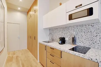 Cuisine ou kitchenette dans l'établissement Serene apartment - 1BR 4P - Canal St-Martin