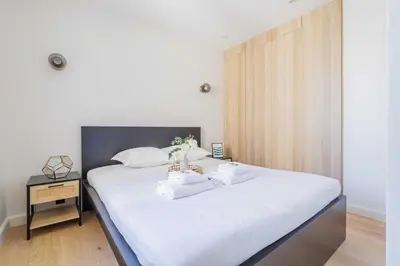 Un ou plusieurs lits dans un hébergement de l'établissement Elegant apartment - 2BR 6P - Sentier