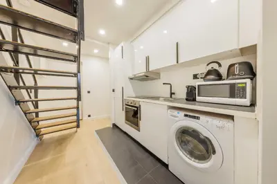 Cuisine ou kitchenette dans l'établissement Elegant apartment - 2BR 6P - Sentier
