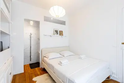 Un ou plusieurs lits dans un hébergement de l'établissement GuestReady - Flat near the Luxembourg Gardens