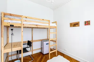 Un ou plusieurs lits superposés dans un hébergement de l'établissement GuestReady - Flat near the Luxembourg Gardens
