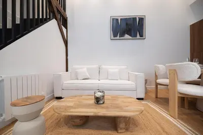 Coin salon dans l'établissement Chic Parisian Loft in Bastille Area