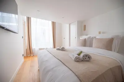 Un ou plusieurs lits dans un hébergement de l'établissement Chic Parisian Loft in Bastille Area