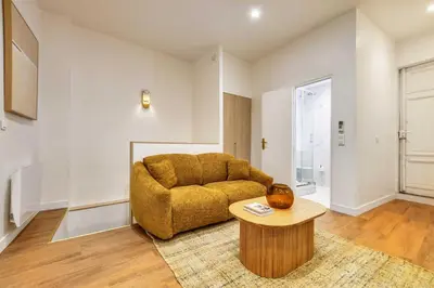 Coin salon dans l'établissement BEAUFITUL APMT - AC -2BR-6P- NOTRE DAME