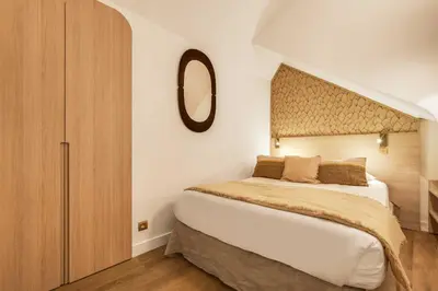 Un ou plusieurs lits dans un hébergement de l'établissement BEAUFITUL APMT - AC -2BR-6P- NOTRE DAME