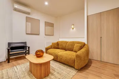 Coin salon dans l'établissement BEAUFITUL APMT - AC -2BR-6P- NOTRE DAME