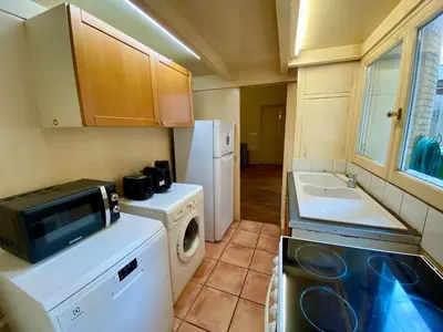Cuisine ou kitchenette dans l'établissement Brune - Appartement Paris 14e 4P