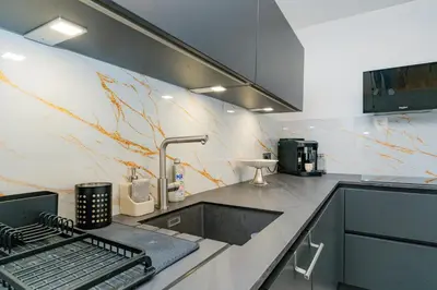 Cuisine ou kitchenette dans l'établissement Le Perchoir Design, Comfort & Eiffel View
